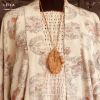 refugium gold trinket on mannequin