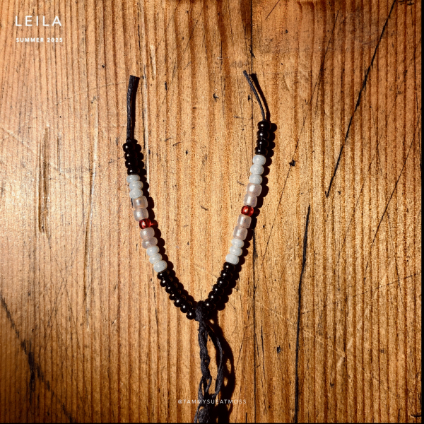 transformation grey pure detail beads woo leila satchel necklace in transformation grey cotton with bead detail picture on table