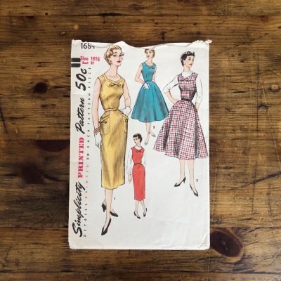 cover of simplicity 1694 dress pattern from 1956 shown for quality
