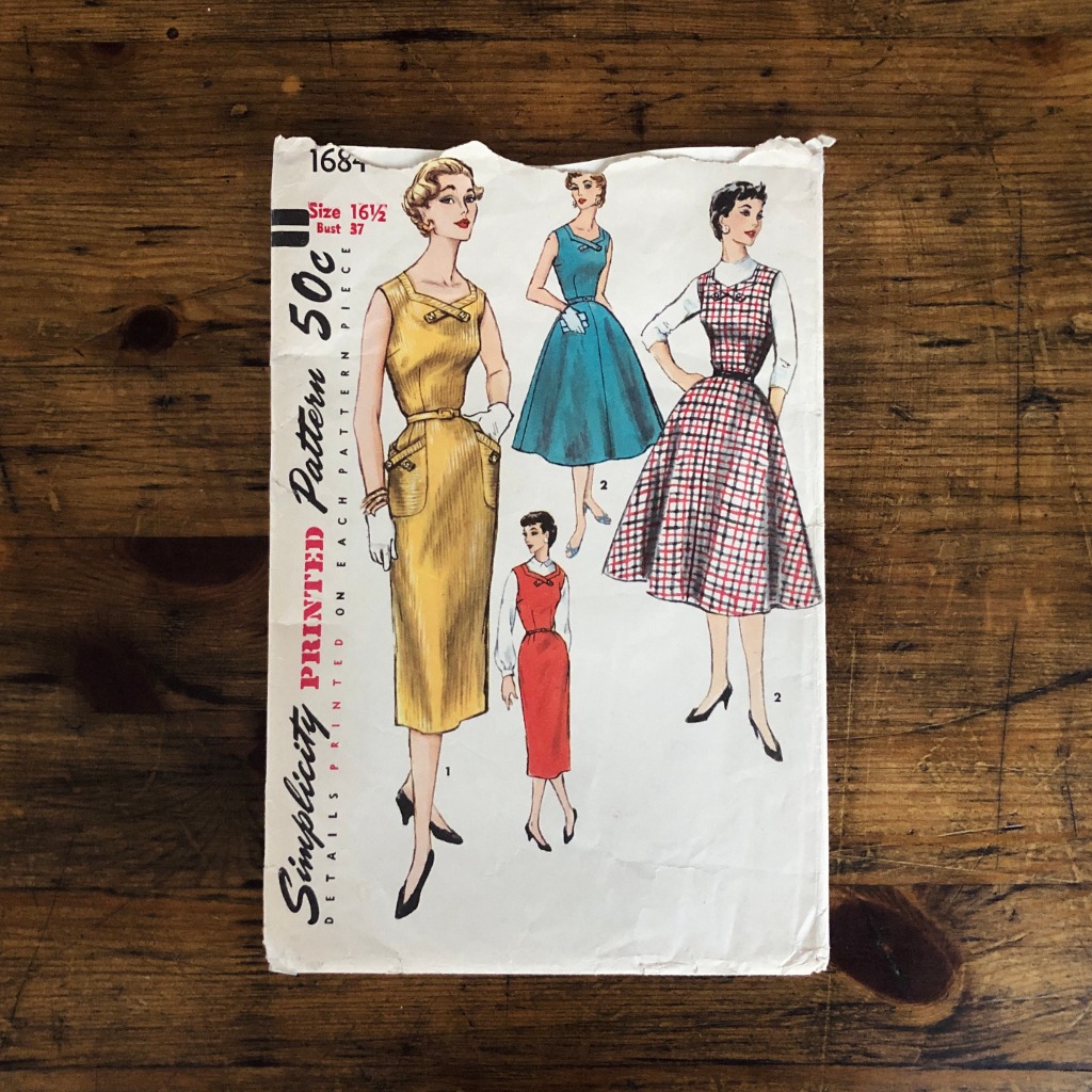 cover of simplicity 1694 dress pattern from 1956 shown for quality